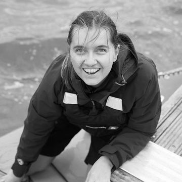 a photo of Flo events and sponsorship manager paddle boarding