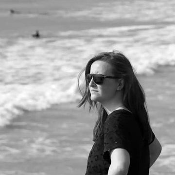 a photo of Jo, marketing coordinator at the beach