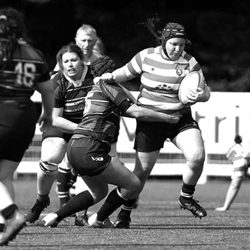 photo of sarah, ecommerce coordinator playing rugby 